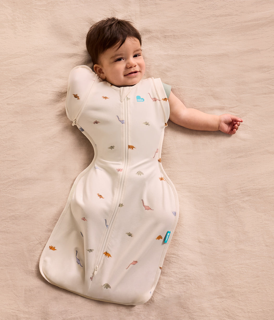 Transitional Object Nappy Swaddle Up™ 2-in-1 Transition Bag 1.0 TOG Cotton Cream Dino Snore ...